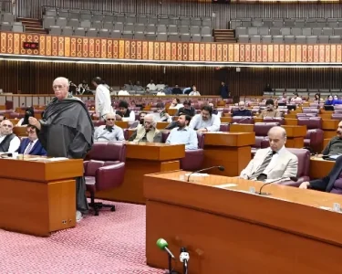 Members of the National Assembly of Pakistan seated during the Budget 2026–27 session as Finance Minister Muhammad Aurangzeb presents the federal budget in Parliament.