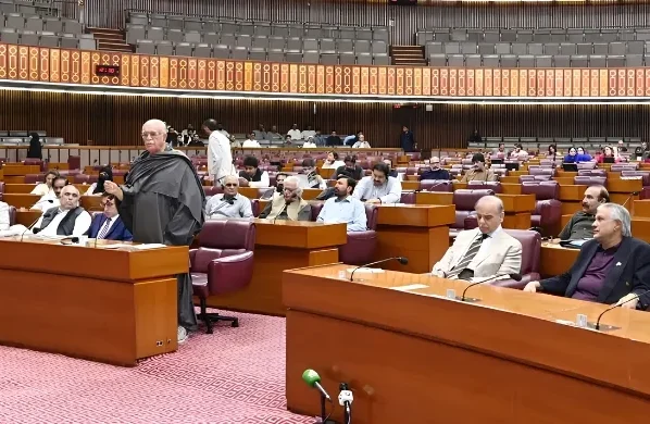 Members of the National Assembly of Pakistan seated during the Budget 2026–27 session as Finance Minister Muhammad Aurangzeb presents the federal budget in Parliament.