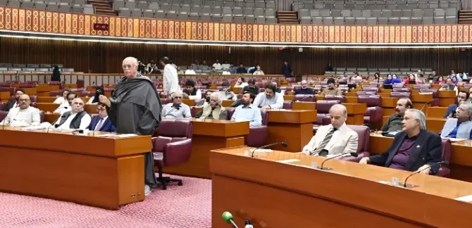 Members of the National Assembly of Pakistan seated during the Budget 2026–27 session as Finance Minister Muhammad Aurangzeb presents the federal budget in Parliament.