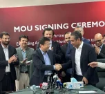 MG JW Automobile Pakistan and RANCON representatives shake hands during MoU signing ceremony for vehicle exports to Bangladesh