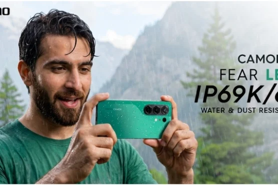 Man using TECNO CAMON 50 in the rain, highlighting its IP68/IP69K water and dust resistance for monsoon photography and outdoor content creation.