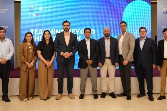 DWP Technologies and GNEXT representatives at the Teaching Beyond the Textbook event in Lahore, promoting digital learning, Apple technology and modern education solutions in Pakistan.